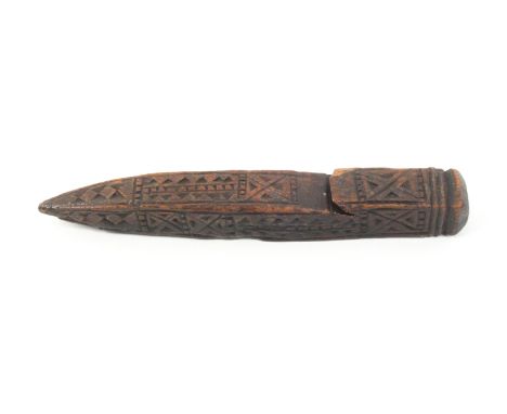 A carved and stained knitting stick of tent peg form, with slot, extensively carved with geometric motifs, 14.5cm 