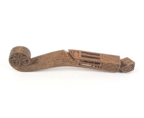 A good early 19th Century wooden English knitting stick, the violin scroll terminal with star carved decoration, the body wit