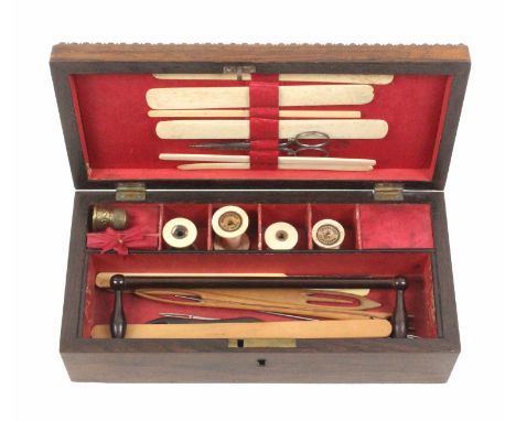 A mid Victorian weighted rosewood netting box of rectangular form the lid with quarter bobbin moulding, the interior with fol