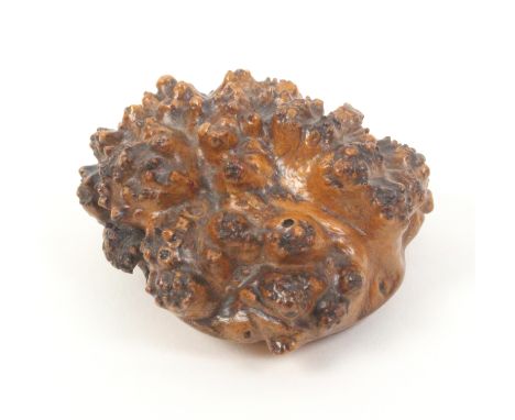A Scottish root wood and penwork snuff box, the oval hinged lid with leaf work border the initials ïWATBÍ, and a scroll ñProg
