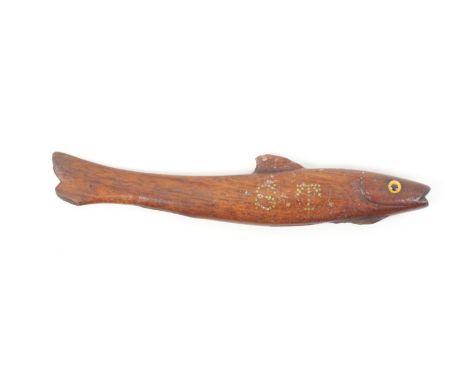 A 19th Century wooden fish form knitting stick in mahogany, glass eyes, initialled in brass pins ïS.T.Í, internal slot, sligh