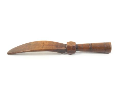 A Welsh fruitwood knitting stick, curved tapering mount initialled in brass pins ñA.P.î over a faceted knop and turned taperi
