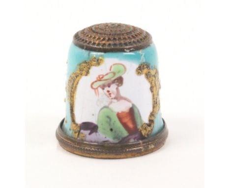An 18th Century English enamel thimble, Staffordshire, the duck egg blue ground with a half length panel of a lady in hat wit