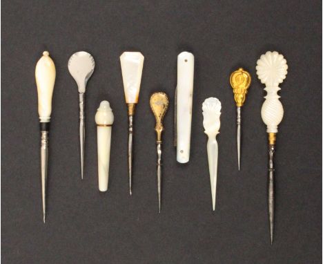 Seven stilettos and two other pieces comprising a mother of pearl example, 6.5cm, three with mother of pearl handles, a steel