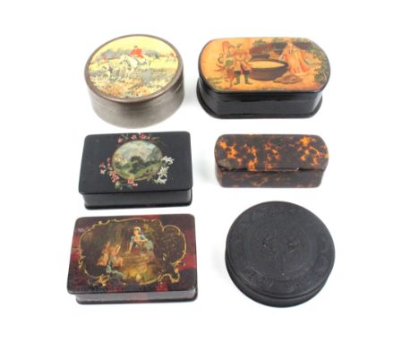 Six 19th Century and later snuff and other boxes, comprising a circular bois durci example with a cherub and love bird amid f