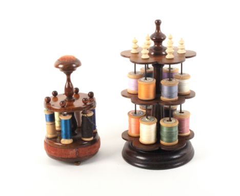 Two small format 19th Century reel stands comprising a rosewood example of three petal shaped tiers on a circular base divide