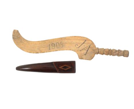 Two knitting sheaths, comprising a curved pale wood example, dated and initialled ñ1904 _ J.A.î with geometric step cut stem,