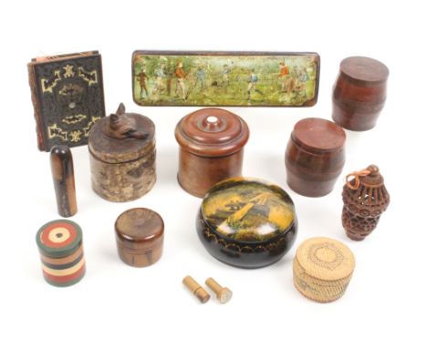 A mixed lot comprising various wooden cylinder boxes, a stamp box with fox head carved finial, a coquilla nut pomander, 8.5cm