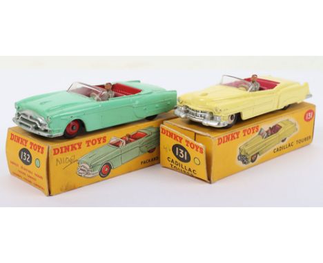 Two Boxed Dinky Toys USA Cars, 131 Cadillac Tourer, yellow body, cerise interior, grey driver, cream wheel hubs correct colou