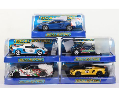 Five Scalextric Slot cars, C3297 McLaren MP4-12C, C3428 Mini Cooper Limited edition 927/1000, C3509 Lotus Exige V6 Cup R, C35