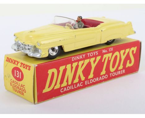 Dinky Toys 131 Cadillac Eldorado Tourer, yellow body, cerise interior, driver, with spun wheel hubs, in very good bright orig