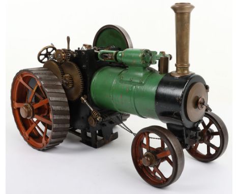 A ¾” scale live steam model Traction engine, possibly Bassett-Lowke, with copper boiler, solid flywheel, top mounted single c