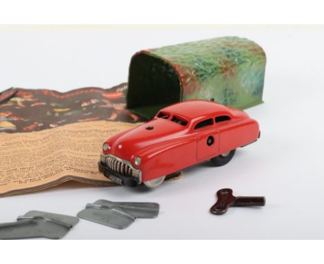 Schuco 3041 Varianto-Limo Tinplate Clockwork Car, red tinplate body, working clockwork mechanism, approx. 11cms, with tinplat