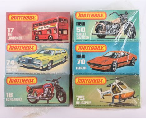 Two Matchbox Lesney Superfast Trade packs of three models,17f The Londoner, 18f Hondarora, 74d Cougar Villager, 50e Harley Da