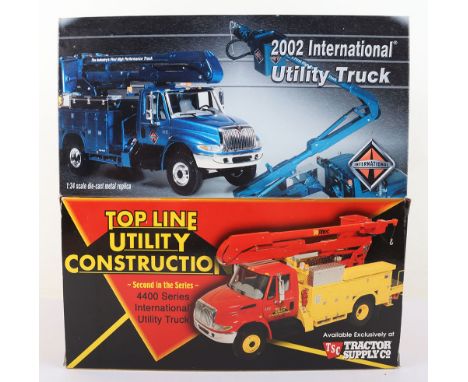 Two First Gear Boxed Trucks, Including: 1:34 scale Diecast metal 2002 International Utility Truck, 19-2828, and 1:34 scale Di