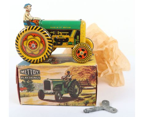 Mettoy Playthings Tinplate Mechanical Farm Tractor, No.6435, lithographed tinplate body, complete with driver, working clockw