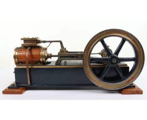 A good single cylinder horizontal steam engine, the brass wood clad 2” bore x 4” stroke cylinder with top mounted valvechest 