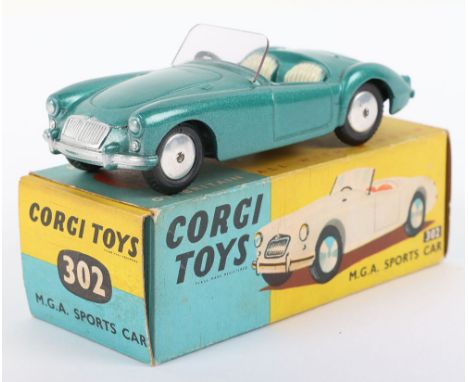 Corgi Toys Boxed 302 M.G.A. sports Car, metallic green body, cream seats, flat spun wheel hubs, in near mint condition, origi