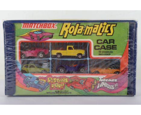 Matchbox Superfast USA issue Rola-matics Carry Case, 6 Vehicles Included, MB-39 Clipper metallic crimson, metallic green base