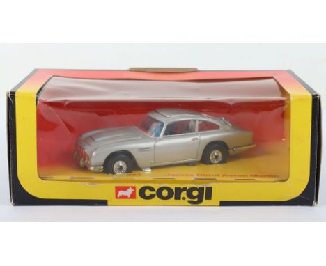 Corgi Toys 271 James Bond Aston Martin DB5, silver body, disc type wheels, red interior, with bandit figure, model is in mint