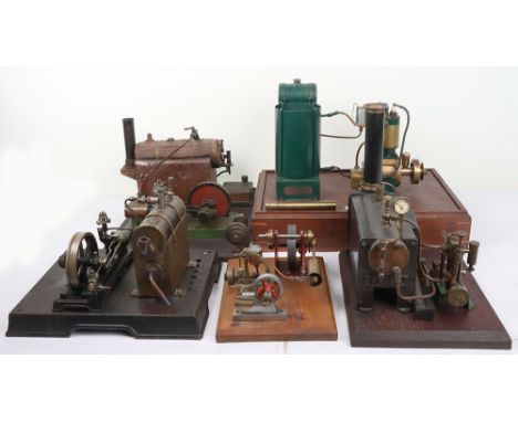 Collection of various Stationary steam engines, including a vertical engine with spark plug, exhaust and water tank, single c