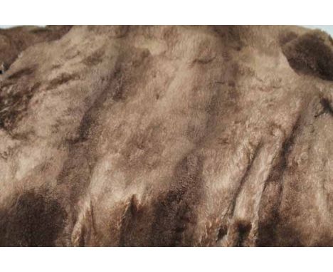 LADY'S SHEARLING COAT
light brown; together with a russian squirrel fur stole