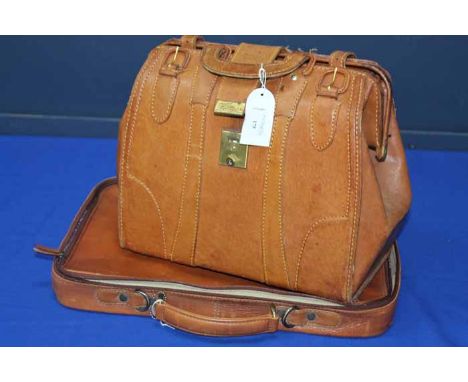 LOT OF LADY'S BROWN LEATHER HANDBAGS
together with a light brown leather satchel with brass mounts, a Tula brown leather lapt