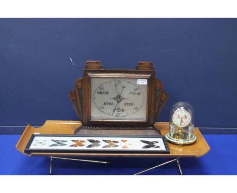 ART DECO CARVED OAK BAROMETER
31cm high; together with a smaller brass anniversary clock by Koma, an oak breakfast tray, with