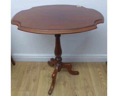 A mahogany side table with a shaped top on a tripod base, polished condition, 72cm tall x 59cm x 43cm 