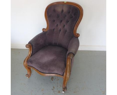 A Victorian mahogany button back upholstered armchair, 108cm tall x 70cm wide 