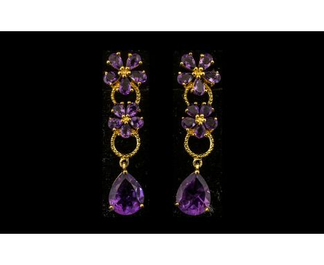 Pair of Amethyst Floral Drop Earrings, pear cut rich purple amethyst drops, suspended from milgrain circles below two graduat