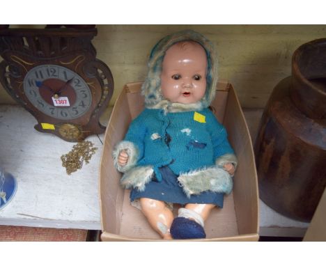 A doll, the neck inscribed A.M., ...518/3 1/2. K.