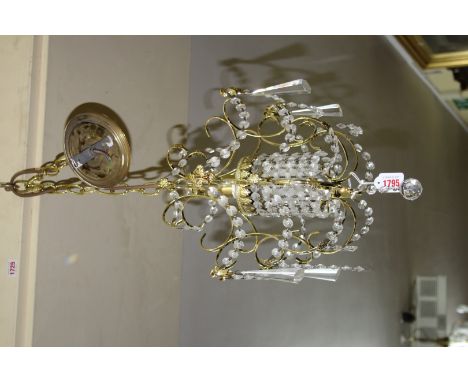 A brass and faceted glass bead ceiling light. 