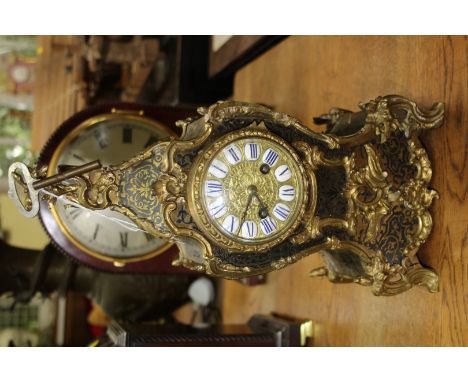 A late 19th century, Louis XVI style, tortoiseshell boulle mantel clock, 35.5cm high. 