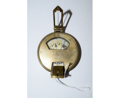 A circa 1910 brass pocket compass, inscribed 'J H Steward Ltd, Strand, London', 7.5cm diameter. 