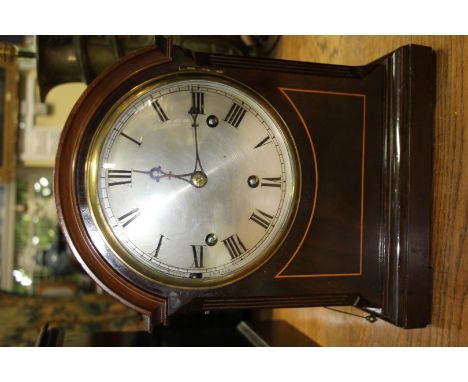 A late 19th/early 20th century mahogany dome top mantel clock, with Westminster chime, 32cm high. 
