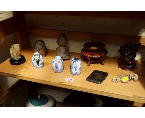 A collection of oriental items; together with two Poole pottery owls.