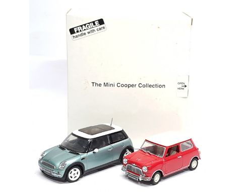 Danbury Mint, 1:18 Scale, The Mini Cooper Collection, a boxed pair. &nbsp;Although unchecked for completeness condition gener