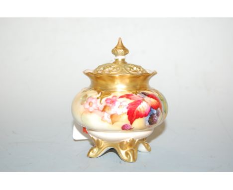 A Royal Worcester porcelain pot pourri jar and cover, decorated with fruit and flowers by Blake, on a blush ground, shape No.