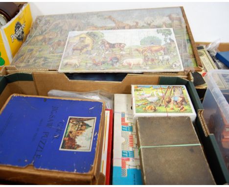 A single box of mid century and later jigsaw puzzles to include GWR, picture puzzle clock, etc