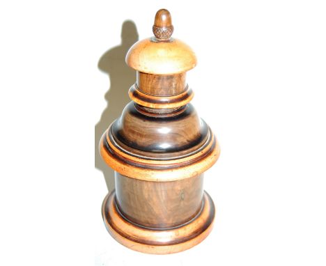A late 19th century treen tea caddy, the cover having acorn finial and opening to reveal one compartment, with further turn-o