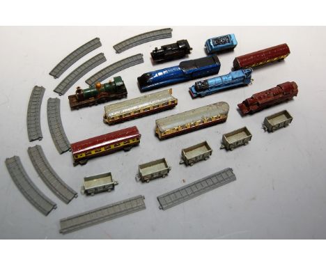 Quantity of Lone Star push along items: 5 locos, 2 coaches, 5 open wagons, some curved and straight track with Dinky Toys art