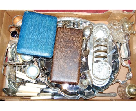 A large collection of mixed silver plated flatware, various dates, makers and patterns, contained in an unusual footstool cas