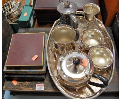 An oak cased canteen of silver plated cutlery; together with a silver plated galleried tray; and cased silver plated flatware