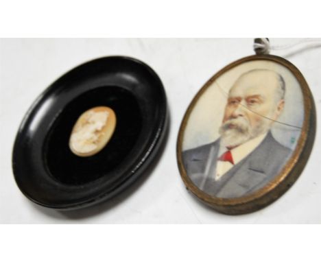 English school, early 20th century, head and shoulders portrait miniature of a gentleman, watercolour on ivory, 7 x 6cm; toge