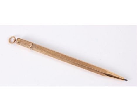 A 9ct gold propelling pencil, the engine turned body with tapered end, and hanging loop, hallmarked Birmingham 1973, 8.9cm lo