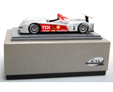 A Le Mans Miniatures by Minimax 1/24 scale diecast model of an Audi R10 TDI Le Mans 2006 winner, finished in silver and red w