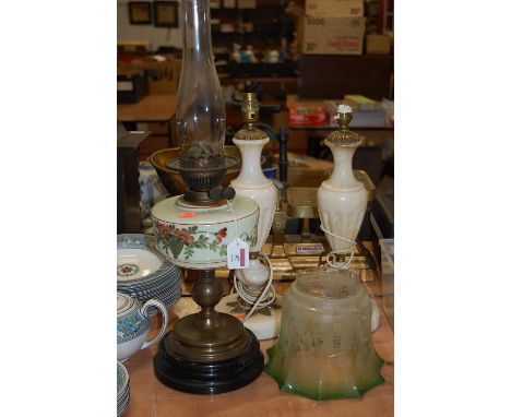 A pair of turned alabaster and brass mounted table lamps, h.42cm (including fittings); together with an early 20th century pe