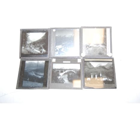 A single box of various glass lantern slides