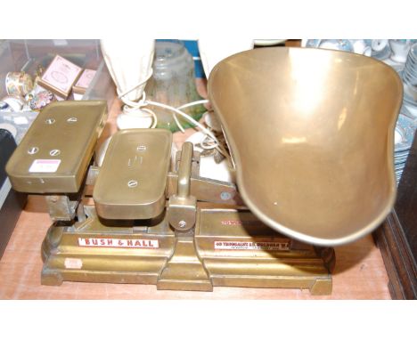A set of Victorian brass grocer's scales by Bush &amp; Hall, to weight 10lbs, with painted label Bush &amp; Hall, 40 Theobald
